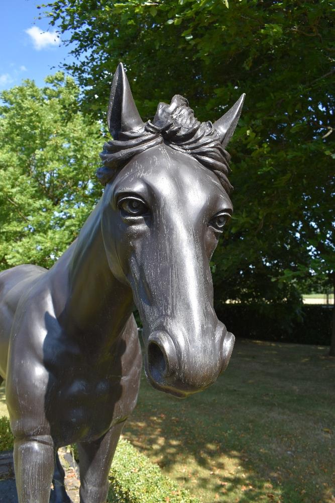 A contemporary bronze life size model of a colt horse standing four square and on integral base, - Image 2 of 4