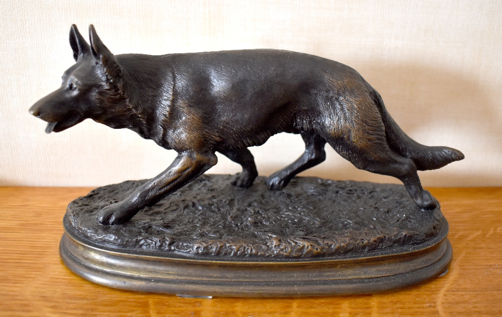 AFTER PIERRE JULES MÊNE; a contemporary bronze figure of an Alsatian on integral oval base, height