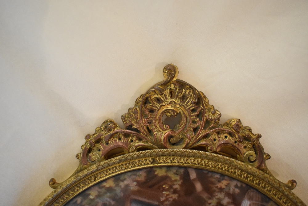 An early 20th century French gilt metal and enamel decorated hand mirror, the back decorated with - Image 4 of 5