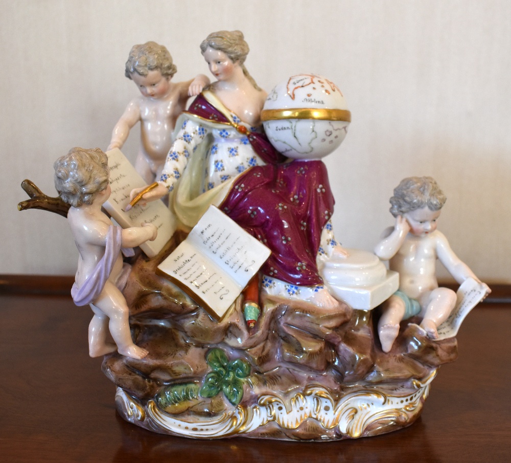 A mid/late 19th century Meissen porcelain figure group representing Geography, with central figure