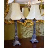 A pair of late 19th century French silver plated cluster column table lamps with acanthus scroll and