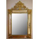 A decorative Venetian inspired brass and etched glass wall mirror, the pierced pediment above