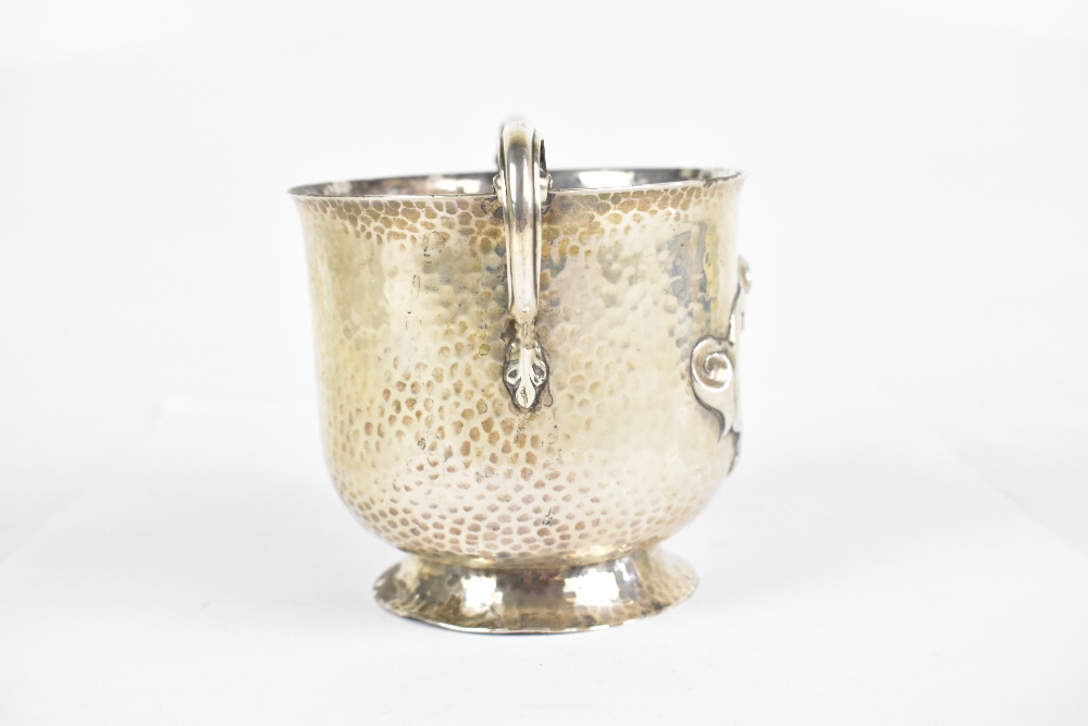 A late Victorian hallmarked beaten silver Arts & Crafts twin handled cup, with stylised central - Image 4 of 5