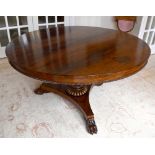 GILLOWS OF LANCASTER; a William IV rosewood breakfast table, the two piece circular top with bead