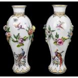 A large pair of 18th century Chelsea porcelain vases of baluster form, each painted with exotic