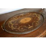 An Edwardian mahogany and satinwood inlaid oval twin handled tray with brass gallery and handles,