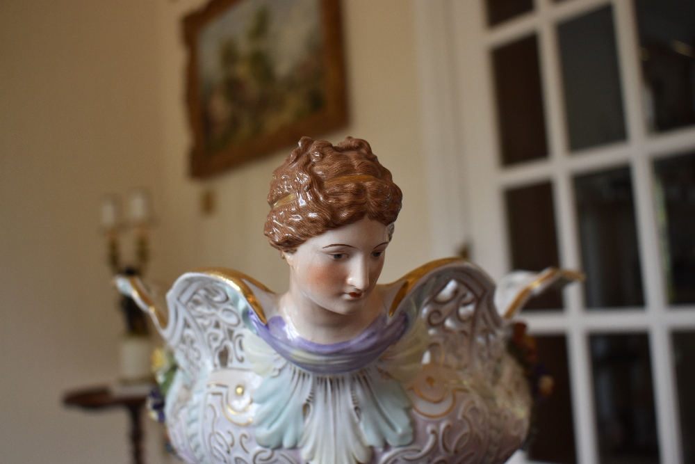 A large circa 1900 Continental porcelain centrepiece with pierced shaped rim, twin female mask - Image 2 of 4