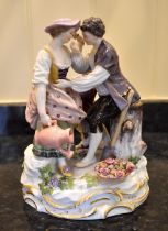A late 19th century Meissen porcelain figure group of male and female gardeners with a boy by