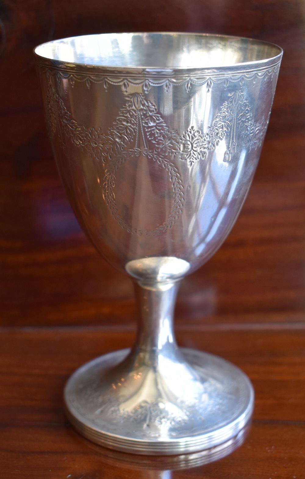 JOSEPH ANGELL; an early Victorian hallmarked silver goblet with band of swag engraved detail above