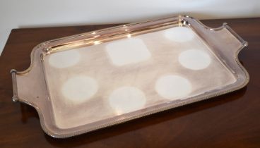 An EPNS twin handled tray of rounded rectangular form, length 50.5cm, width 30.25cm. Provenance: The