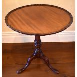 A George III mahogany piecrust top circular tilt-top occasional table, the one piece top above