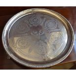 WILLIAM & JOHN BARNARD; a late Victorian hallmarked silver circular tray with fine floral and