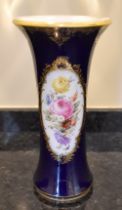 A late 20th century Meissen porcelain trumpet vase with gilt heightened detail on a dark blue