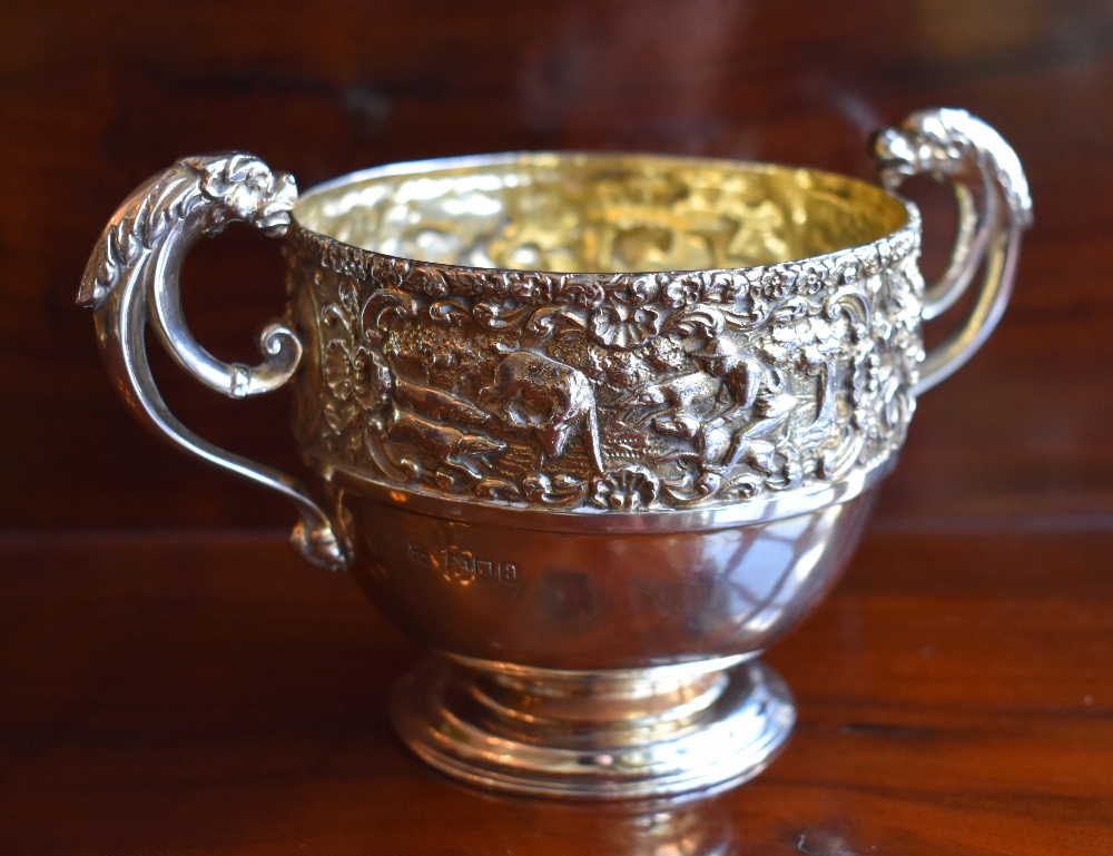 HUNTING INTEREST, WAKELY & WHEELER; a quality late Victorian hallmarked silver gilt twin handled cup