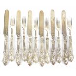 AARON HADFIELD; a set of six silver sheath handled and silver bladed knives and forks, Sheffield