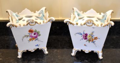A pair of Meissen Marcolini period potpourri pots and covers of tapering square section, each with