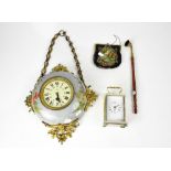 A French painted metal wall clock, the painted dial set with Roman and Arabic numerals,