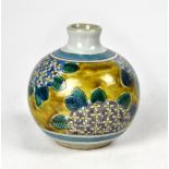 A squat baluster vase in the Oriental style,