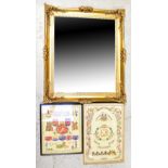 A gilt framed wall mirror, rectangular mirror plate in frame with shell and C-scroll decoration,