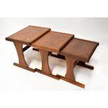 E GOMME LTD OF LONDON FOR G-PLAN a vintage retro teak framed nest of tables,