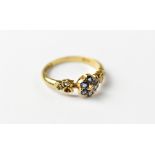 An 18ct yellow gold sapphire and diamond ring,