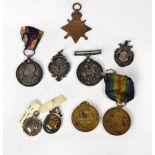 A WWI group of three medals relating to 01458 PTE M Burns R.Lance.