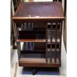 A mid-20th century mahogany revolving bookcase, 92 x 59 x 59cm.