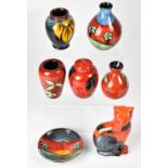 POOLE; a group of seven ceramics to include a baluster bud vase, height 14cm,