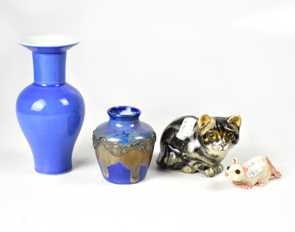 A Winstanley kitten with glass eyes, a small Winstanley white mouse with glass eyes,