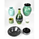 POOLE; a group of seven ceramics to include three varying size baluster vases,
