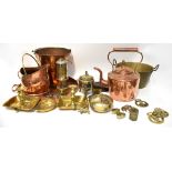 A quantity of copper and brassware to include a twin-handled tray with circular motif to the centre,