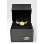 ORIS; a ladies' vintage gold plated and stainless steel wristwatch, with automatic movement,