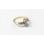 A vintage 18ct gold diamond ring, the two brilliant cut diamonds approx .