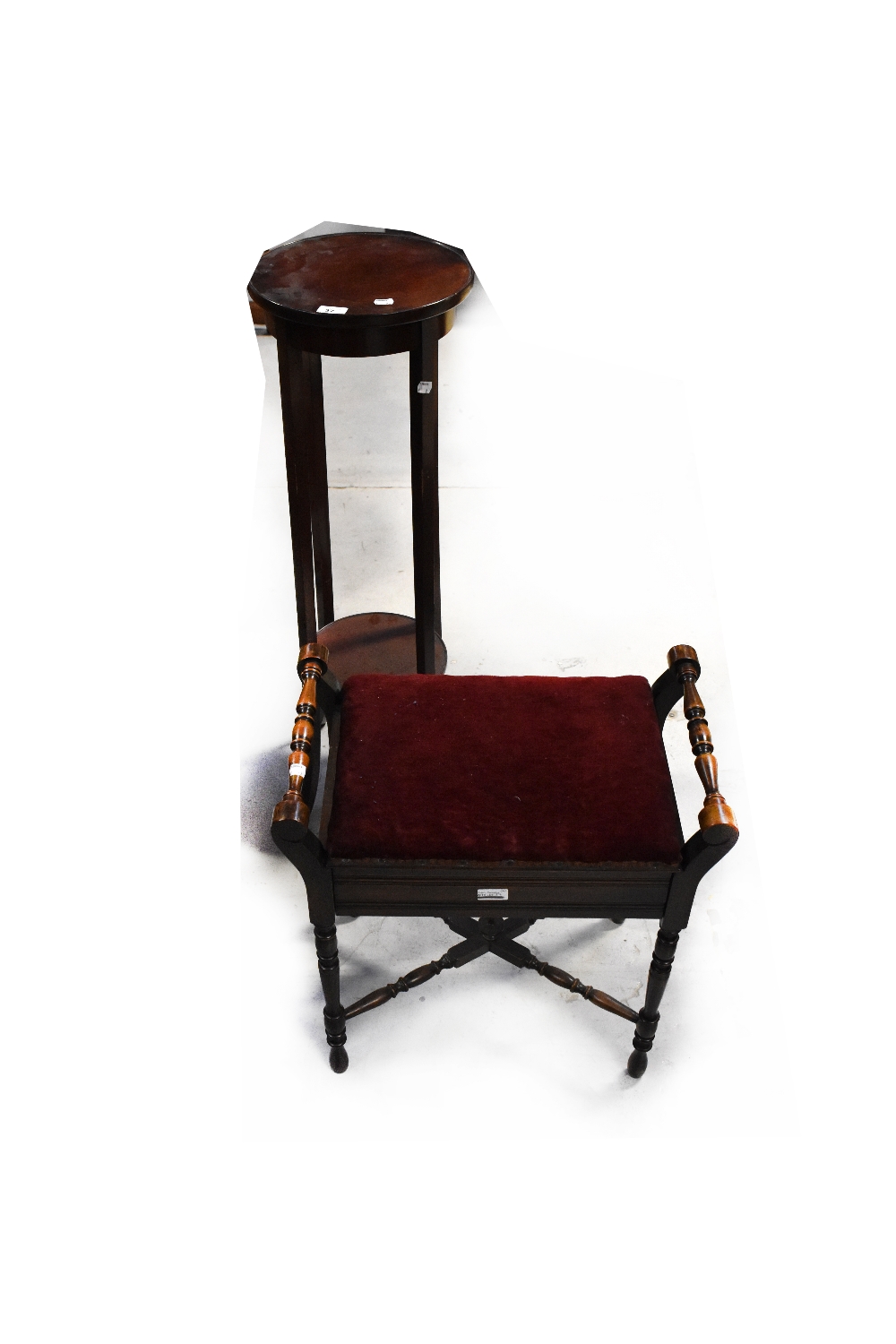 An Edwardian mahogany piano stool and an Edwardian mahogany jardinière stand (2).