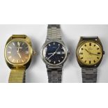 Three vintage gentlemen's wristwatches comprising a Newmark Swiss made shock resistant watch,