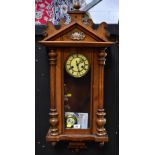 GUSTAV BECKER; a mahogany cased regulator wall clock, the circular dial set with Roman numerals,