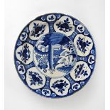 An 18th century Delft blue and white charger,