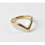 A yellow metal (probably 9ct) wishbone ring, size M, approx 3g.