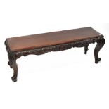 A late 19th/early 20th century window seat/bench, to carved cabriole supports, height 51cm,