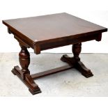 An early 20th century mahogany crossbanded draw-leaf dining table,