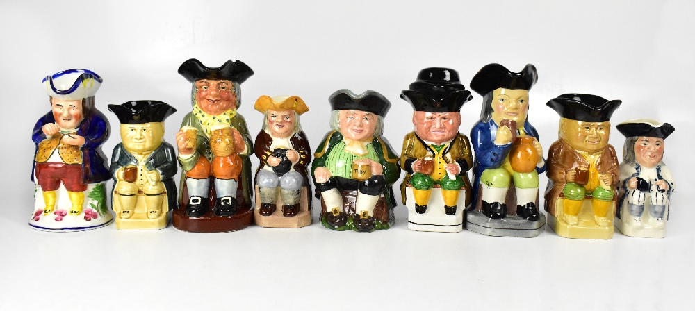 A collection of twenty character and Toby jugs to include a Royal Doulton 'Happy John',