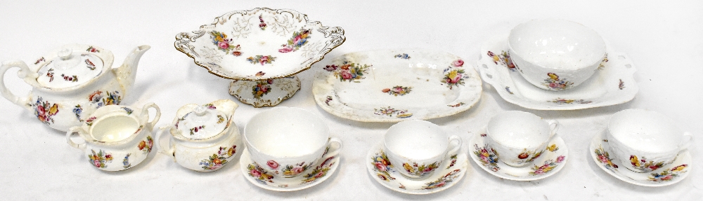 A c1900 Coalport part tea/dinner service with typical hand-painted floral decoration on white