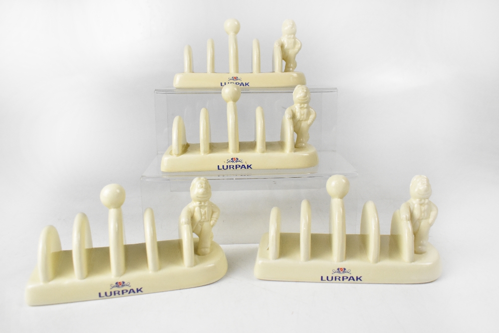 Four retro Lurpak ivory ceramic toast racks (4).