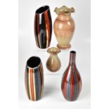 POOLE; three non-matching vases by Andrew Tanner, two cylindrical vases and a baluster vase,