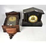 A Victorian slate mantel clock in architectural style case,