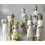 A collection of modern Spanish high gloss figures to include a yawning child in nightdress,