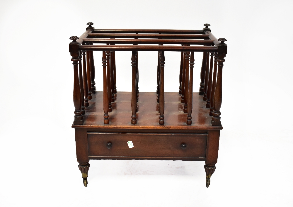 A 19th century mahogany Canterbury, the sectioned top with slender turned supports,