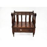 A 19th century mahogany Canterbury, the sectioned top with slender turned supports,