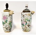 A pair of late 19th/early 20th century Chinese vases decorated with birds amongst chrysanthemums,