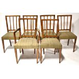A set of six Edwardian satinwood inlaid stick back dining chairs with stuffover seats and tapering